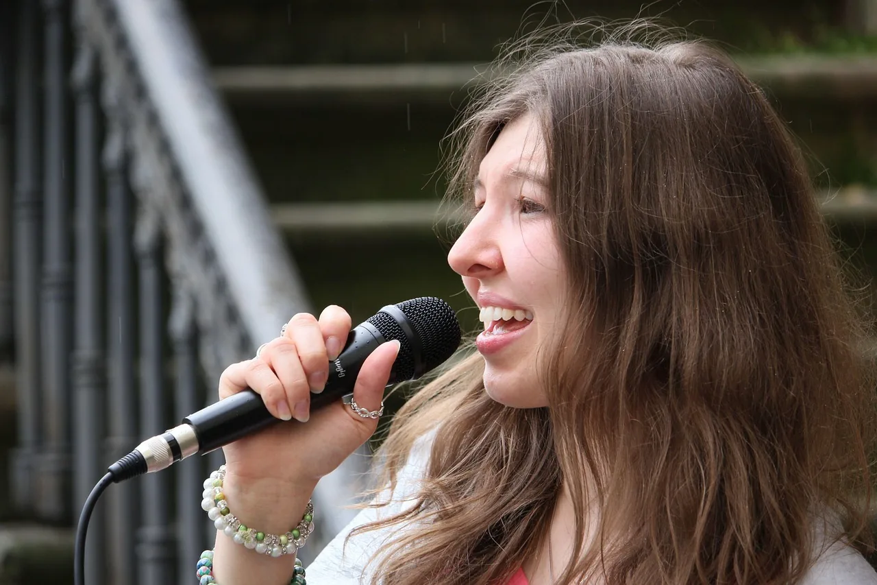 Singer at an outdoor microphone Singer at an outdoor microphone