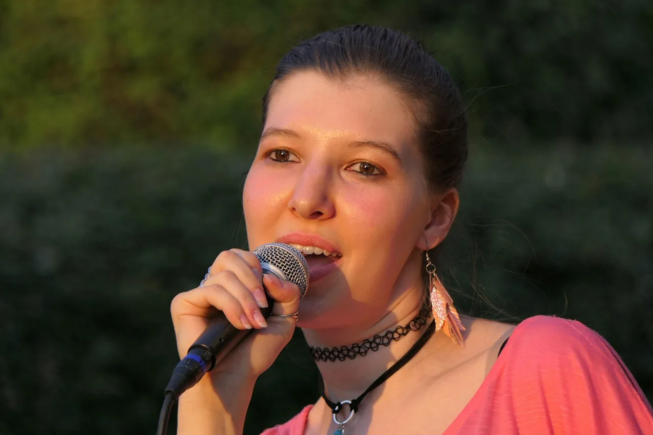 Singer at an outdoor microphone Singer at an outdoor microphone