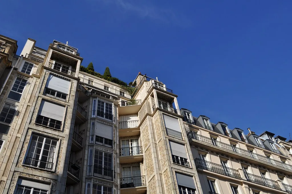 Residential facade with wrought-iron balconies Residential facade with wrought-iron balconies