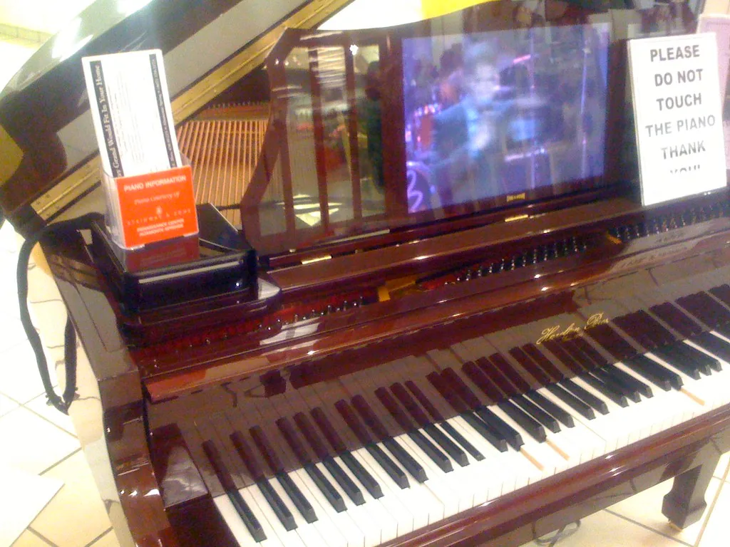 Keyboard and open lid of a grand piano Keyboard and open lid of a grand piano