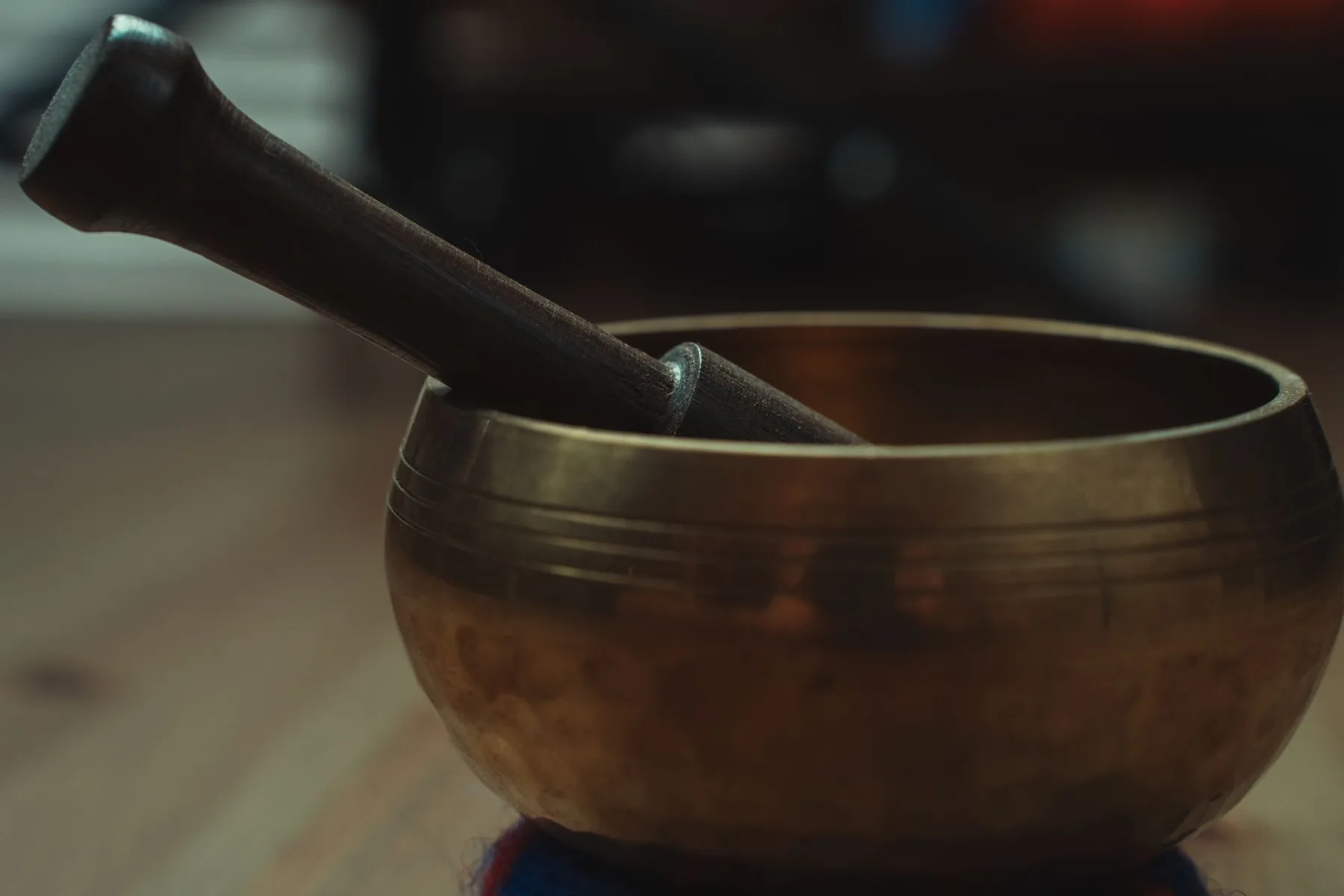 Tibetan singing bowl with a wooden mallet Tibetan singing bowl with a wooden mallet