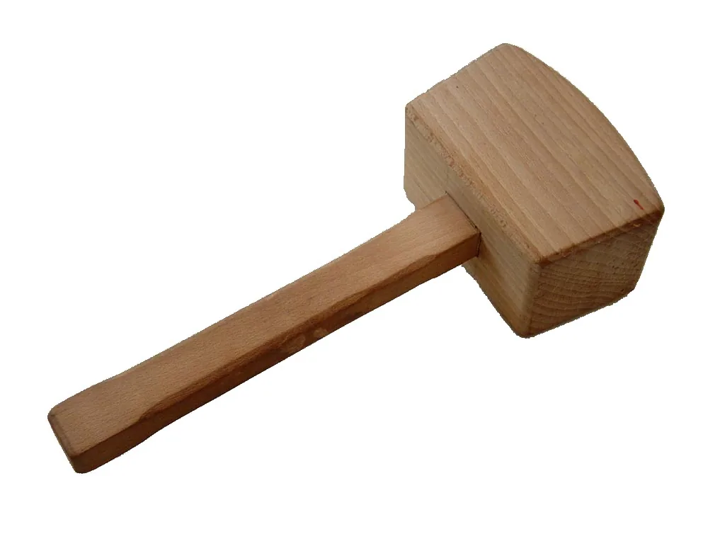 Light wooden mallet on a white background Light wooden mallet on a white background